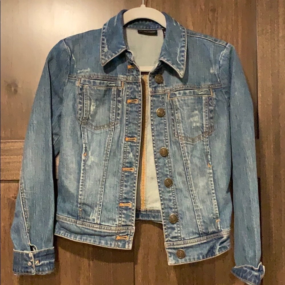 Distressed denim jacket